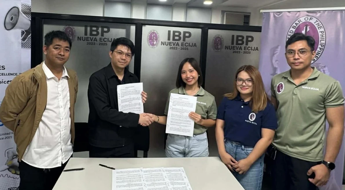 Partnership signing and institutional collaboration.